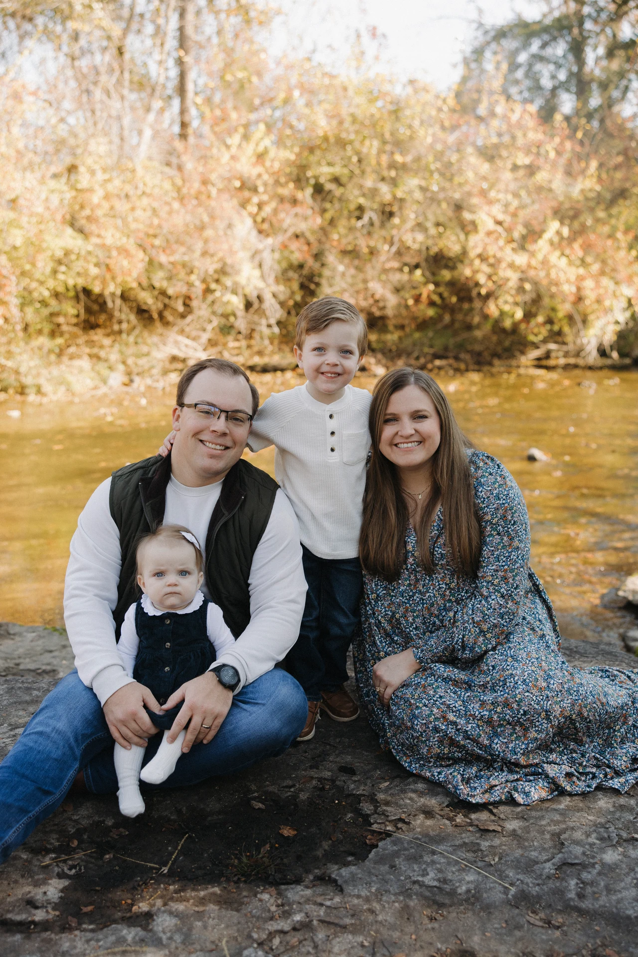 Dr. Chandler Cole with her husband and their two children outdoors